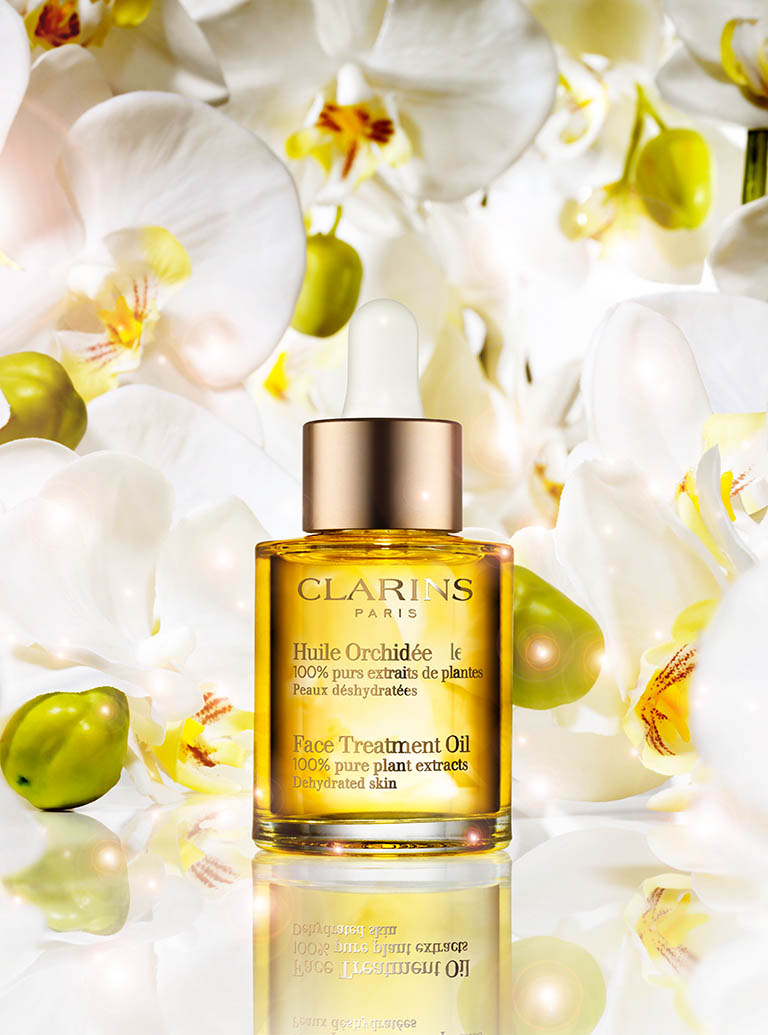 Cosmetics Photography of Clarins treatment oil bottle by Packshot Factory