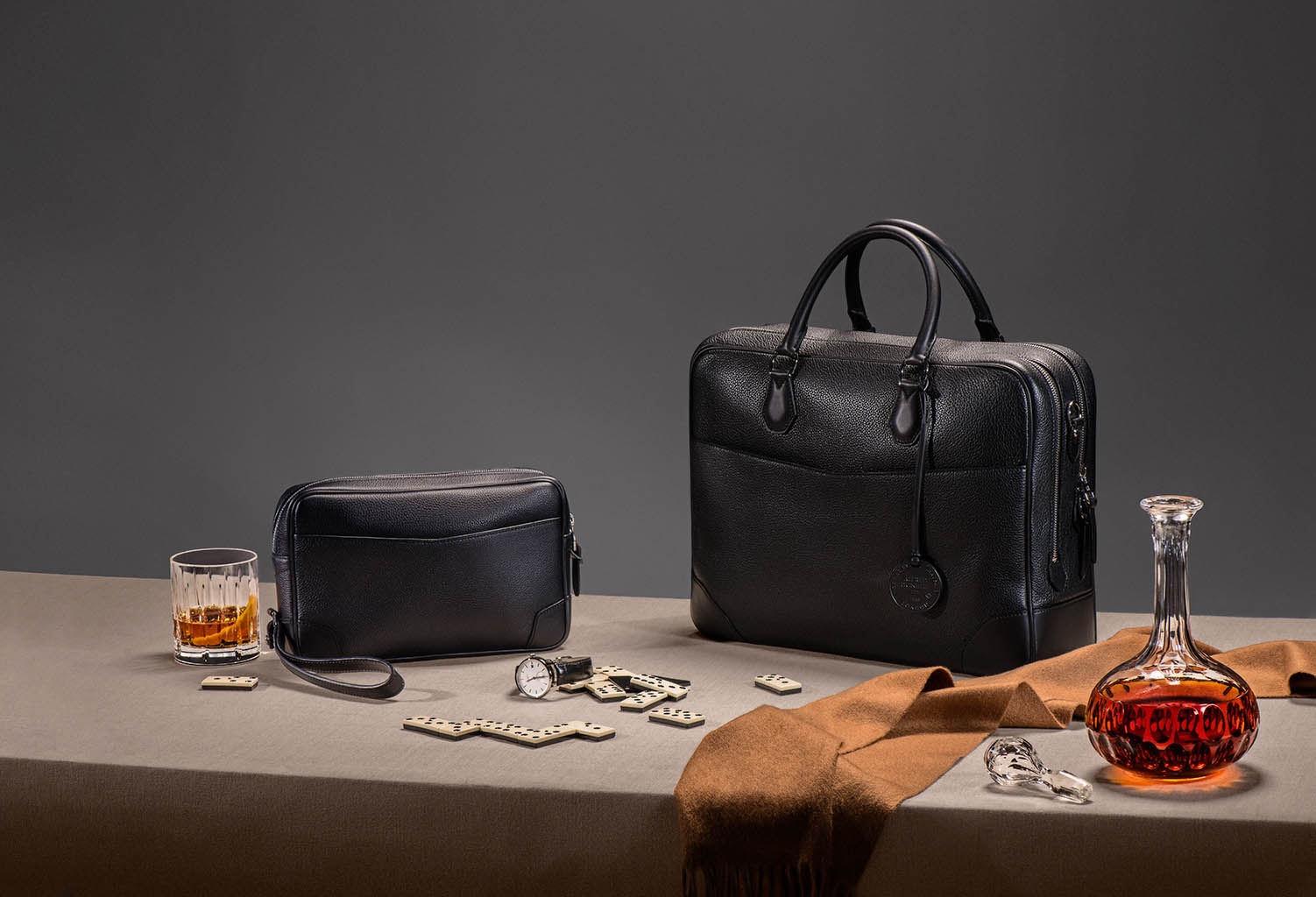 Fashion Photography of Alfred Dunhill leather briefcase and pouch by Packshot Factory