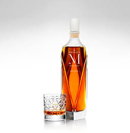 Glass Explorer of Macallan whisky bottle and serve