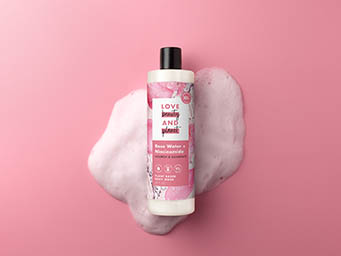 Coloured background Explorer of Love Beauty and Planet body wash