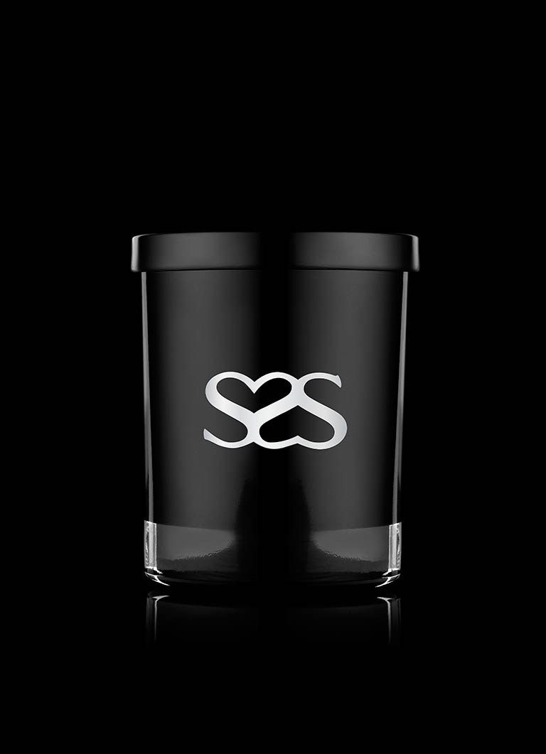 Still Life Product Photography of Secret Seduction candle by Packshot Factory