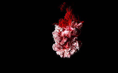 Liquid / Smoke Photography of Red and white ink explosion