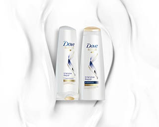 Advertising Still life product Photography of Dove shampoo and conditioner bottles with texture