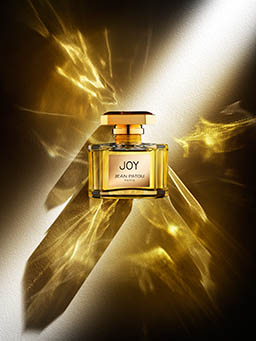 Liquid / Smoke Photography of Joy perfume bottle
